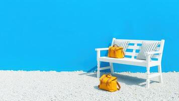 High contrast outdoor scene with sky blue wall and yellow hiking bag photo