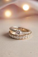 Elegant Diamond Engagement and Wedding Rings on Soft Background photo