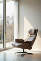 Modern Leather Armchair in Bright Sunlit Room with Large Window photo