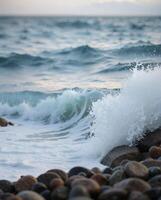 Gentle Waves Crashing on Colorful Pebbles at the Seaside Shoreline photo