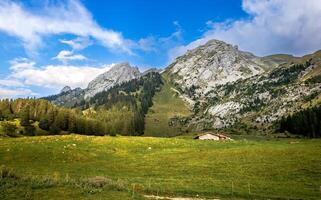 Mountain ladscape in the French Alps with a blue sky photo