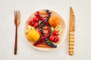 DNA food and genetically modified foods, DNA helix structure on plate. photo