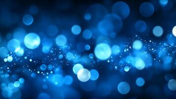 Abstract blue bokeh background with blurred lights and sparkles. photo