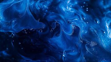 Abstract blue liquid swirls with bubbles, creating a mesmerizing pattern. photo