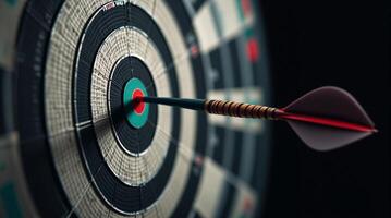 A dart hitting a target in the center of a dartboard photo