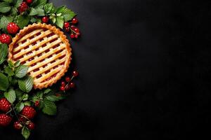 Delicious raspberry pie with lattice crust, surrounded by fresh raspberries and red currants photo