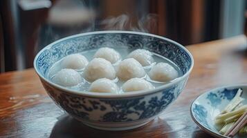 Steamed Fish Balls in a Traditional Chinese Bowl photo