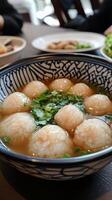 Delicate Rice Balls in Aromatic Soup A Culinary Delight photo