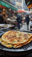 Crispy Egg Pancake at a Busy Street Market photo
