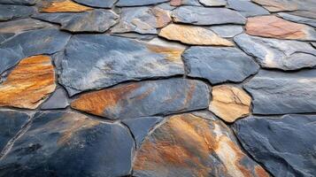 Stone wall cladding showing textured surface with colorful veins photo