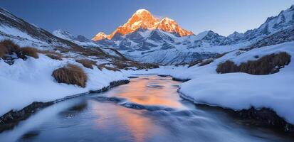 Ama dablam reflecting in the river at sunset, during winter in the himalayas photo