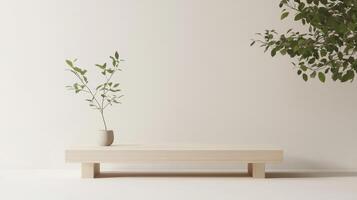 A plant sits on a wooden bench in front of a wall photo
