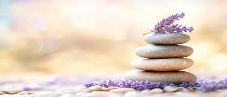Calming spa decor with stacked stones and lavender flowers, creating serene atmosphere for relaxation and wellness. Perfect for tranquil setting photo