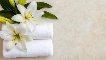 Luxurious spa interior featuring white lilies and soft towels, creating serene atmosphere for relaxation and rejuvenation. Perfect for wellness and tranquility photo