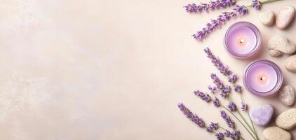 Relaxing spa background featuring lavender flowers, candles, and smooth stones. This serene composition creates calming atmosphere perfect for wellness and self care photo
