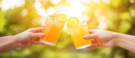 Cheers to summer with refreshing cocktails in hand, garnished with lime. sun sets beautifully in background, creating warm and inviting atmosphere photo
