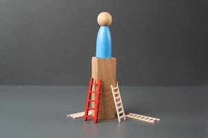 Reach the top after many attempts. Career success. Loneliness. Education and acquiring new skills. Credit lines and financial instruments to help to succeed. photo