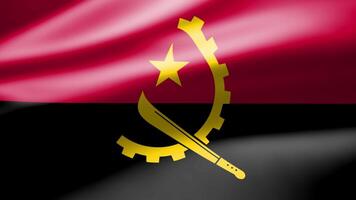 Angola flag in close up moves in waves in the wind with reflecting light on the smooth silky surface. video
