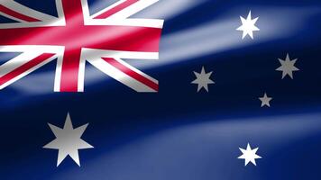 Australia flag in close up moves in waves in the wind with reflecting light on the smooth silky surface. video