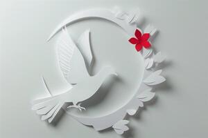 White paper-cut dove surrounded by a circular leafy design with a single red flower accent on a light gray background, symbolizing peace and unity photo