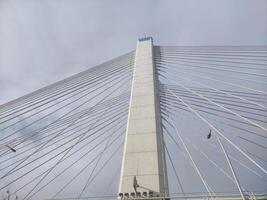 Modern bridge with strings background photo
