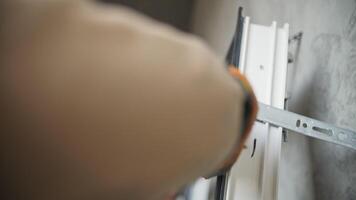 Installing rubber gasket on a window frame video