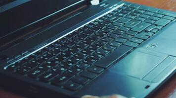 Man opening laptop and starts typing on keyboard of computer 02 video