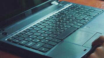 Man opening laptop and starts typing on keyboard of computer 01 video