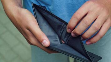 The poor man looks at the empty wallet 03 video