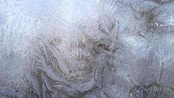 Abstract frosty pattern on glass, background texture on the window 02 video