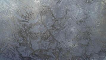 Abstract frosty pattern on glass, background texture on the window 01 video