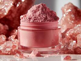 Close up of pinkish fair face powder reveals its fine texture and satin finish. powder sparkles elegantly in sleek round case set against clean white backdrop photo