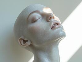 realistic bald silicone mannequin head is displayed upright against clean white backdrop. soft lighting accentuates facial contours and creates modern aesthetic photo