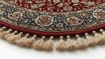 Capturing beauty of small bedside rug featuring intricate floral designs in rich red and gold piece adds stylish touch any room its fine craftsmanship against white backdrop photo