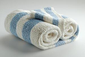 Flatwoven cotton bedside rug features simple pastel blue and white stripes showcasing its lightweight texture and clean edges against pristine white backdrop photo