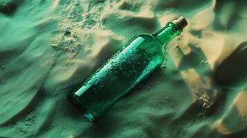 Green Glass Bottle Partially Submerged in Sand photo