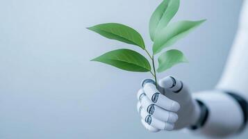 Robotic hand holding green plant leaves on a light background Technology and nature integration concept photo