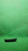 Solitary Fishing Boat on Vibrant Green Sea with Dramatic Atmospheric Mist Reflecting Tranquility and Isolation in Minimalist Design for Nature and Adventure Themes photo