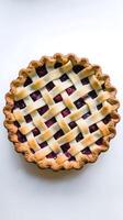 Lattice crust pie with light filling, golden brown crust on white background Vertical Mobile Wallpaper photo