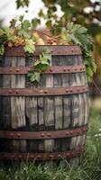Barrel with grapevine leaves in a rustic outdoor setting exudes charm Vertical Mobile Wallpaper photo