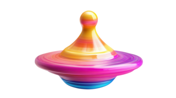 A colorful spinning top rotates on a smooth surface, showcasing vibrant patterns in bright hues of pink, yellow, and blue under natural light. png