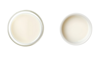 Two shallow bowls containing a thick, creamy substance on a transparent background perfect for culinary use or design elements. png