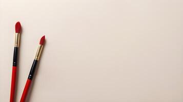 A calligraphy brush dipped in red ink, ready to write celebratory messages, placed on a neutral-colored background with space for more text. photo