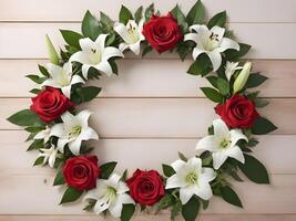 The gorgeous wreath, featuring red roses, white lilies, and green leaves, is positioned on a wooden surface with space in the center for a romantic message. photo
