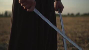 A Cossack with two sabres in his hands looks into the distance at the enemy 02 video