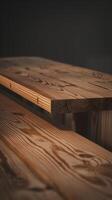 Wooden surface with visible grain patterns contrasts dark background, emphasizing natural texture Vertical Mobile Wallpaper photo