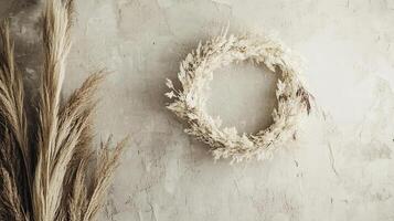 Elegant Dried Flower Wreath on a Light Beige Wall photo