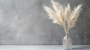 Elegant Pampas Grass Arrangement in a Glass Vase photo