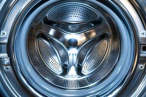 Inside view of washing machine drum showing its cleanliness and functionality photo
