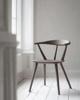 Modern Wooden Chair In Bright Room Setting photo